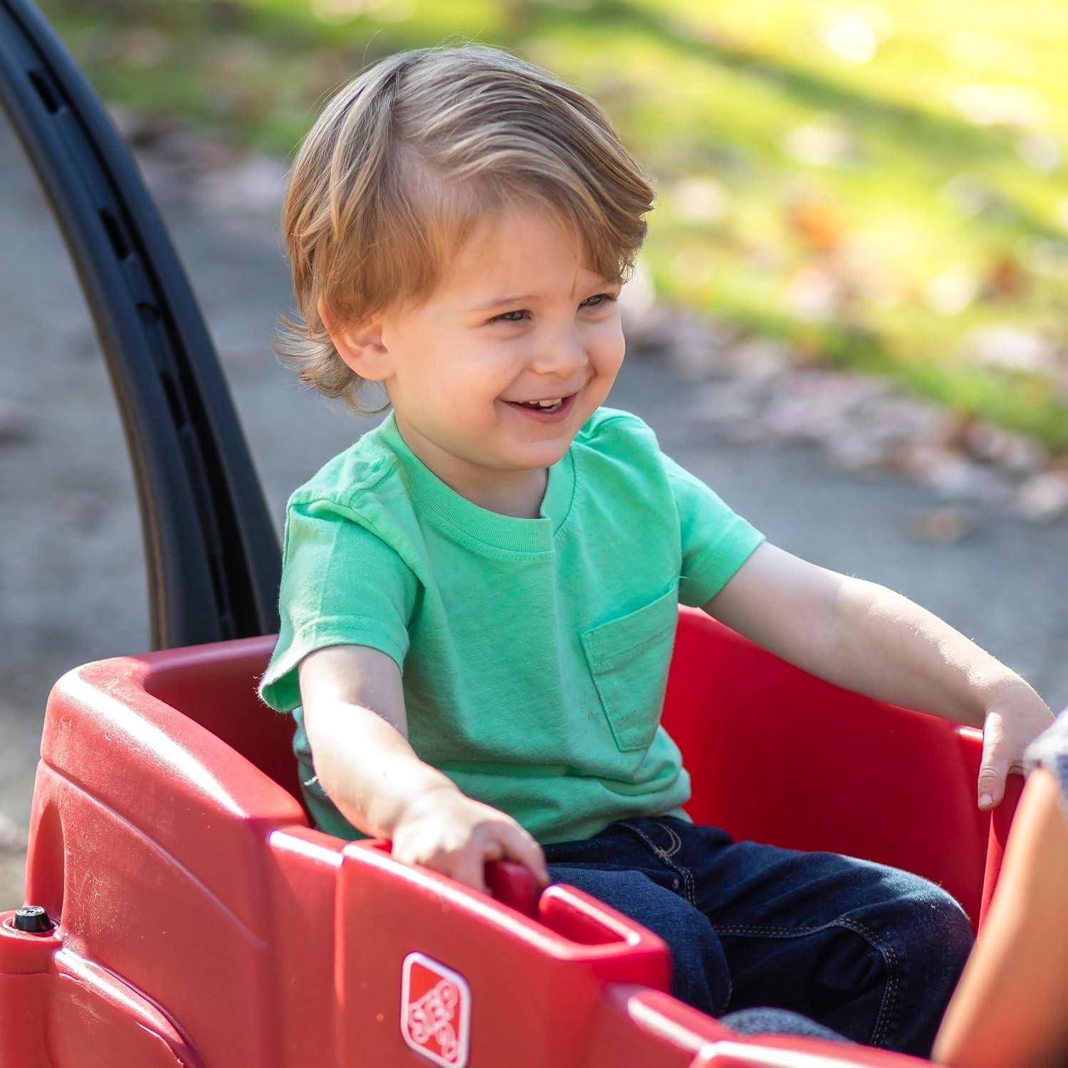 Red Plastic Wagon with Adjustable Seat Belts