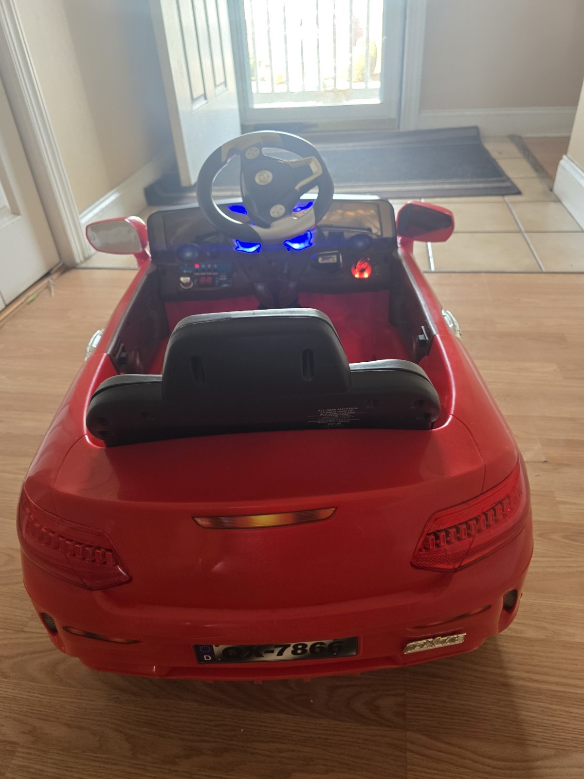 Mercedes-Benz SL65 12V electric ride-on car for children with remote control.