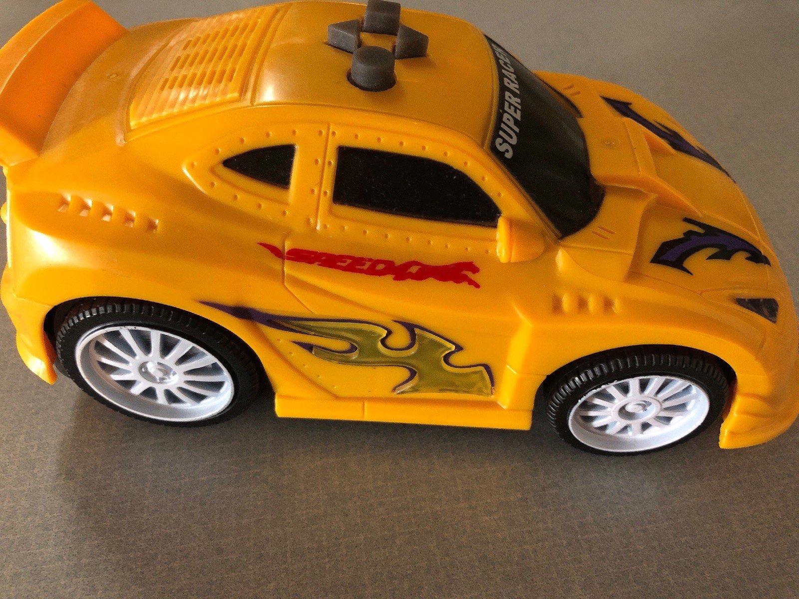 Super Racer Yellow Battery Powered Kids Toy 7”x3”x3” Fun Fun Fun!