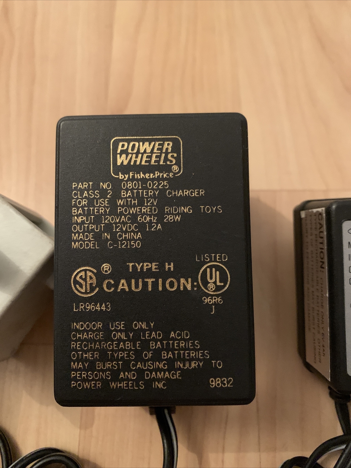 Set of four type H power wheels by Fisher-Price battery chargers