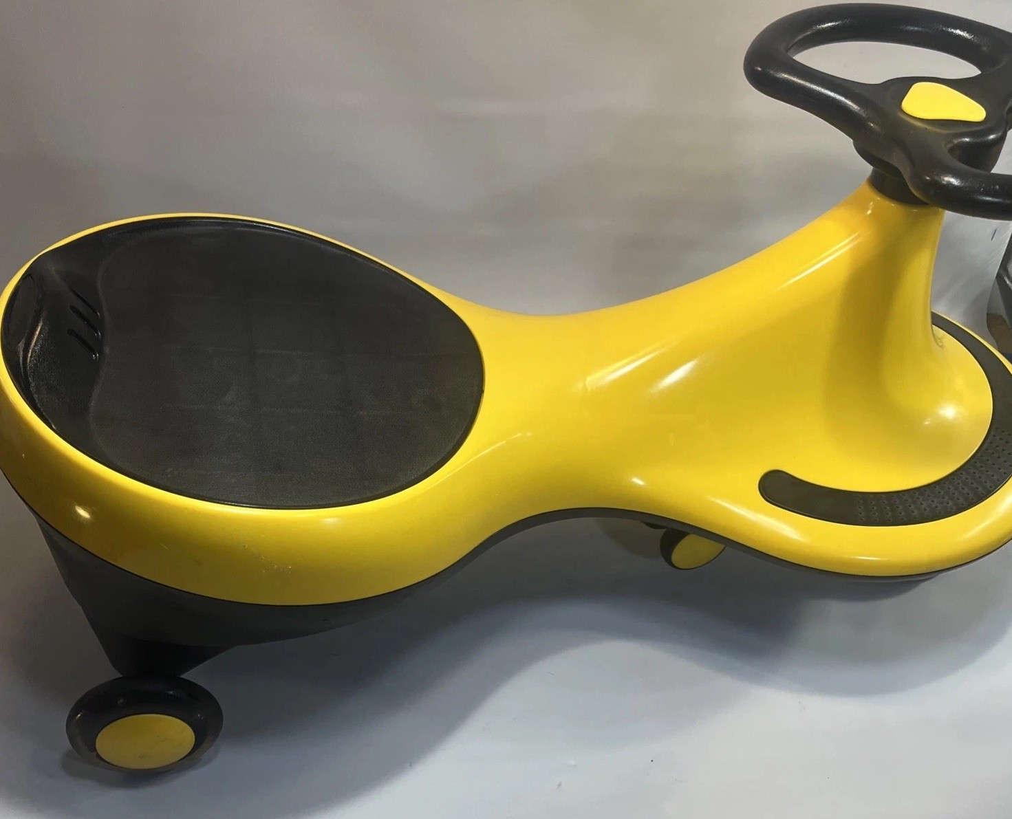 Kids Wiggly Ride-On Yellow Car Toy Light Up Wheels Ride Vehicle