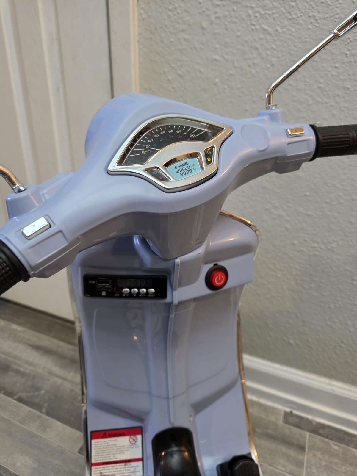 Blazin’ Wheels 12V Vespa GTS Super Sport battery-operated ride-on scooter. Kids