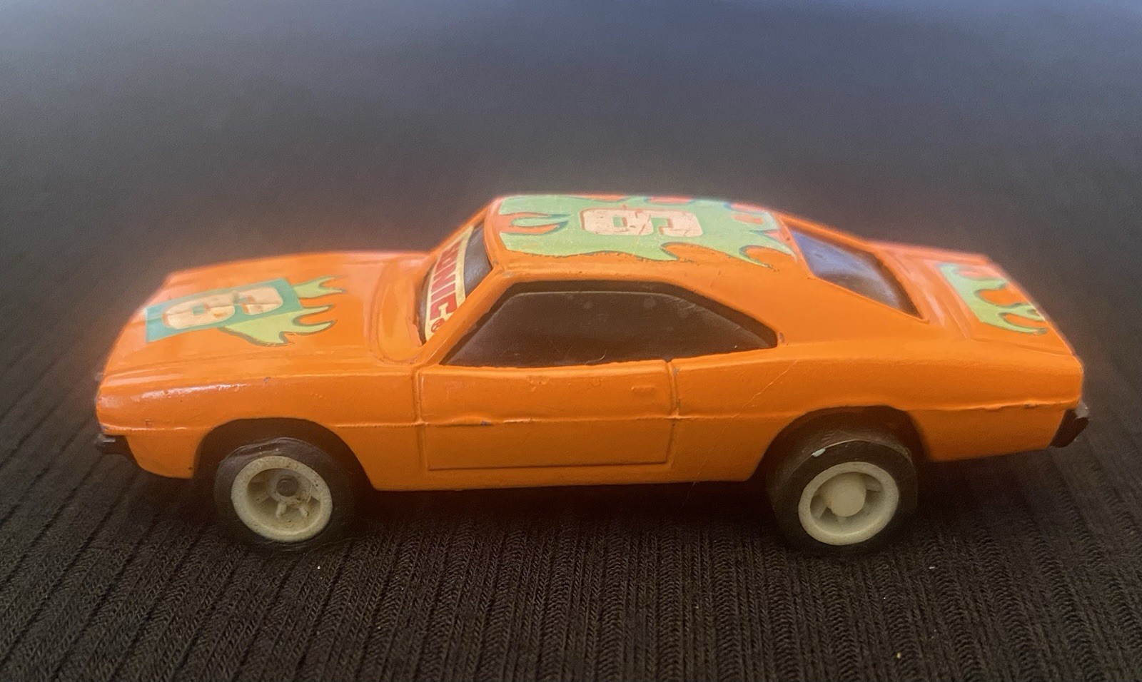 Orange Toy Car With Sonic On Windshield And Number 6 On Hood