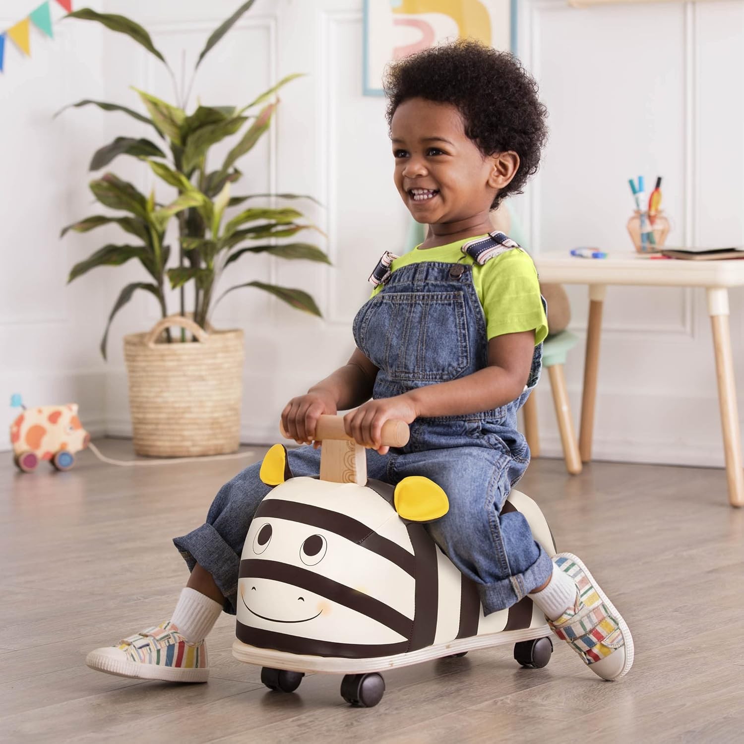B. toys – Ride – On Zebra – Ride – On Toy for Toddlers – Soft Seat – Wooden Toys