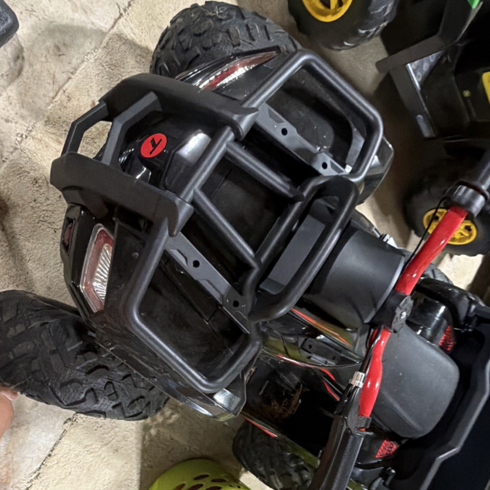 Torex Battery Operated Ride-On Toy ATV Black Red with Rear Storage Compartment
