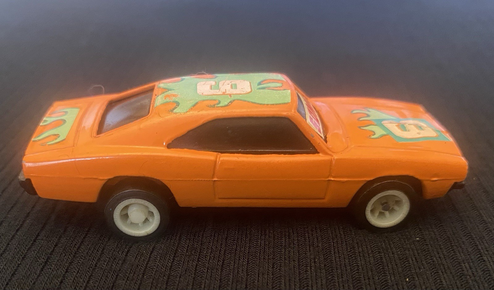 Orange Toy Car With Sonic On Windshield And Number 6 On Hood