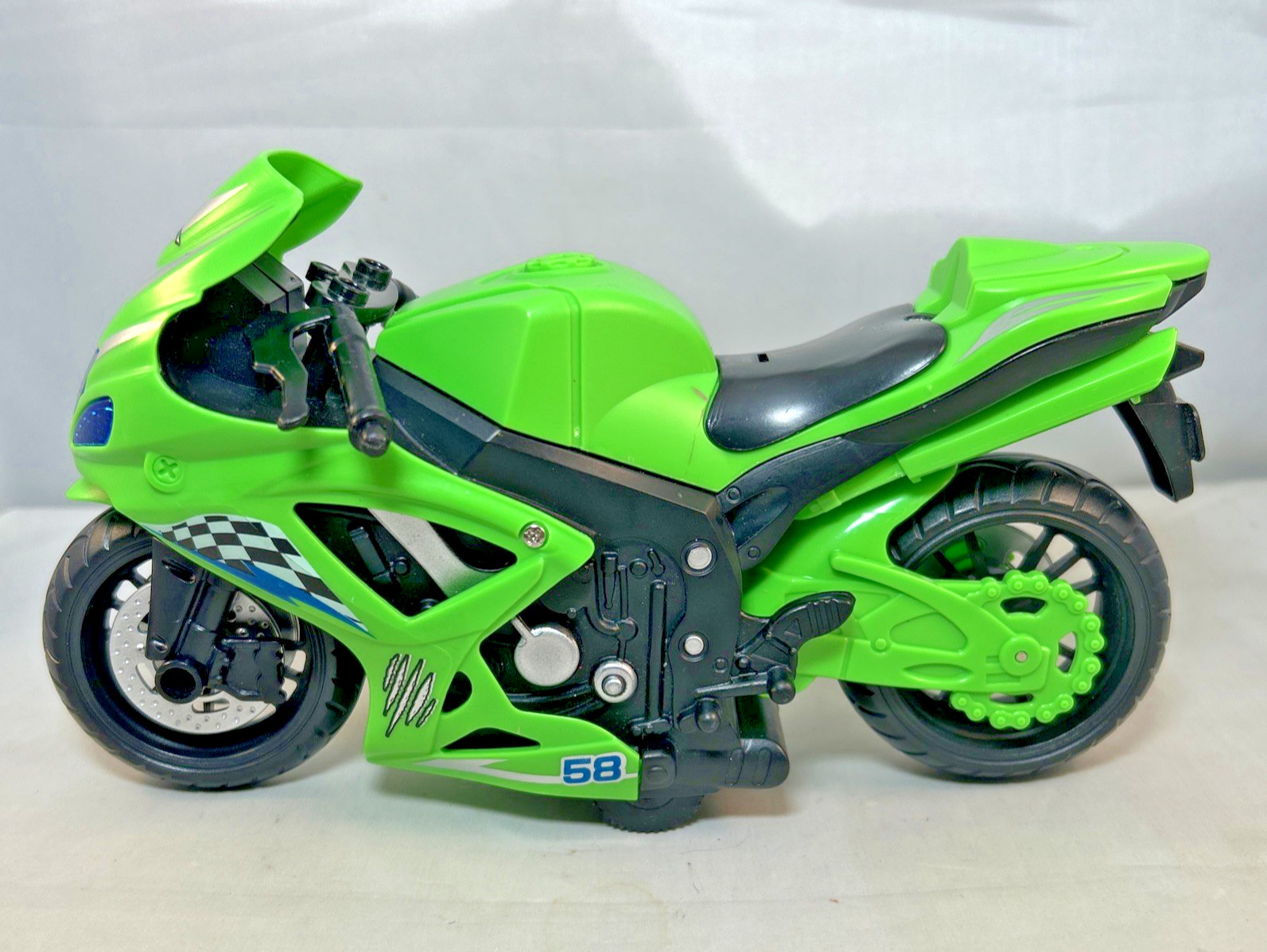 Raxx Wheel Motorcycle Light And Sound Friction Green – *Does not Work*