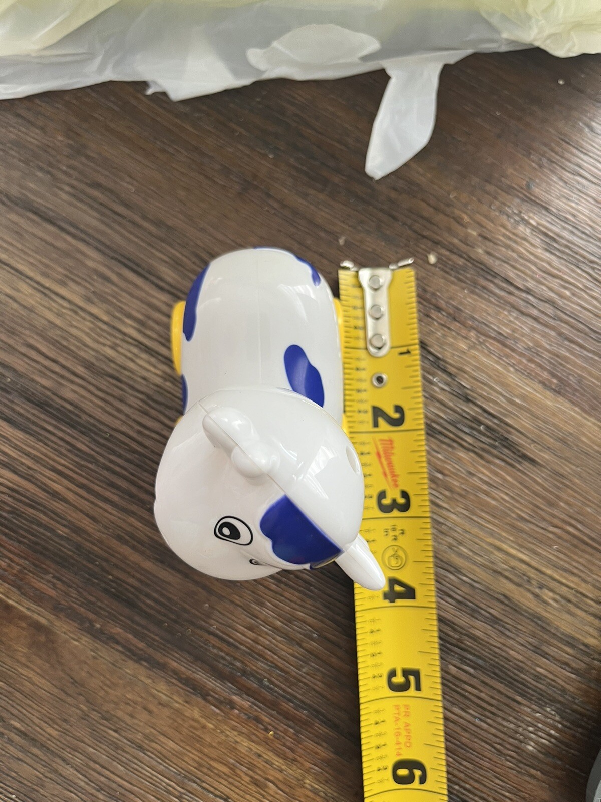 Small Cow on wheels toy with turning head