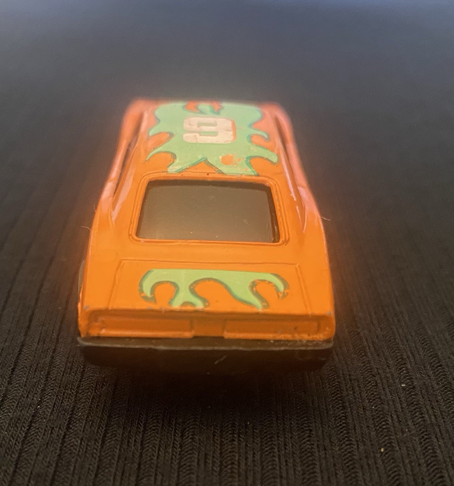 Orange Toy Car With Sonic On Windshield And Number 6 On Hood