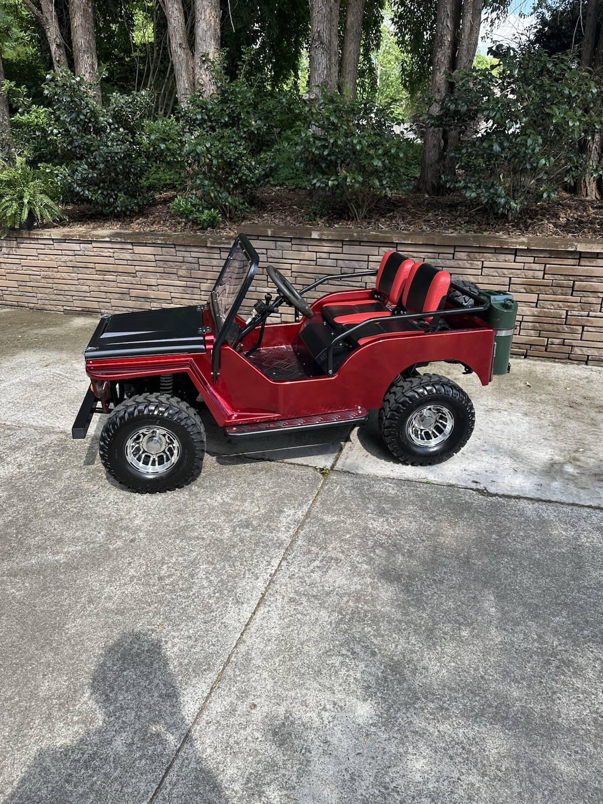Red Gas power Operated Ride-On Jeep, Two Seats, Off-Road Tires, Used, Top 40 Mph