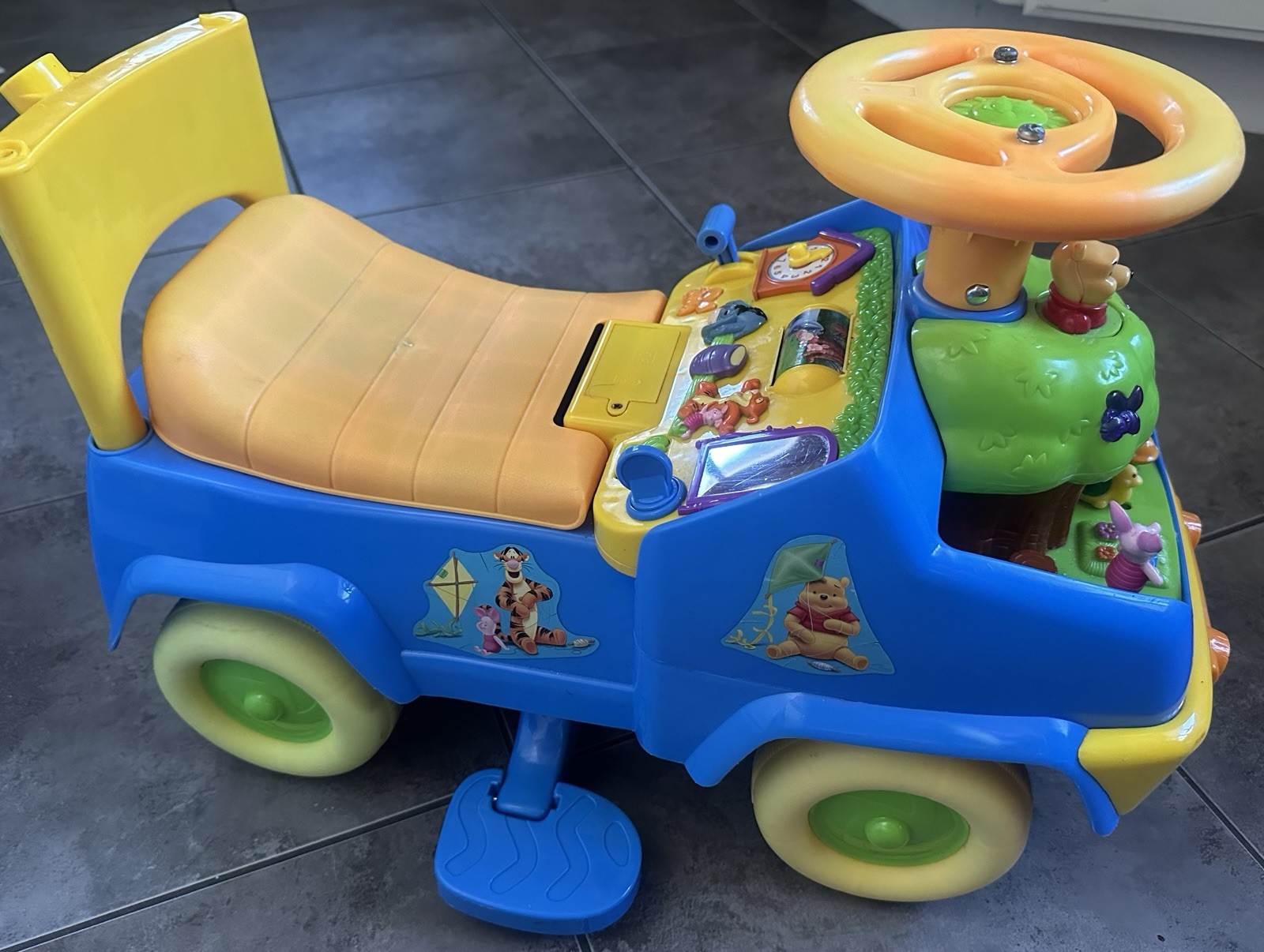 Kiddieland Winnie The Pooh Ride On Toy With Push Handle
