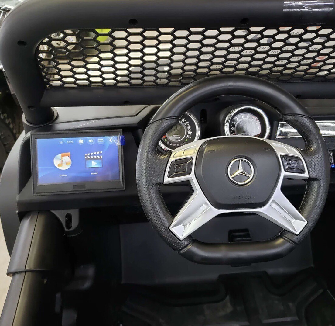24v ride on Mercedes-Benz Unimog 4×4 Black UTV.