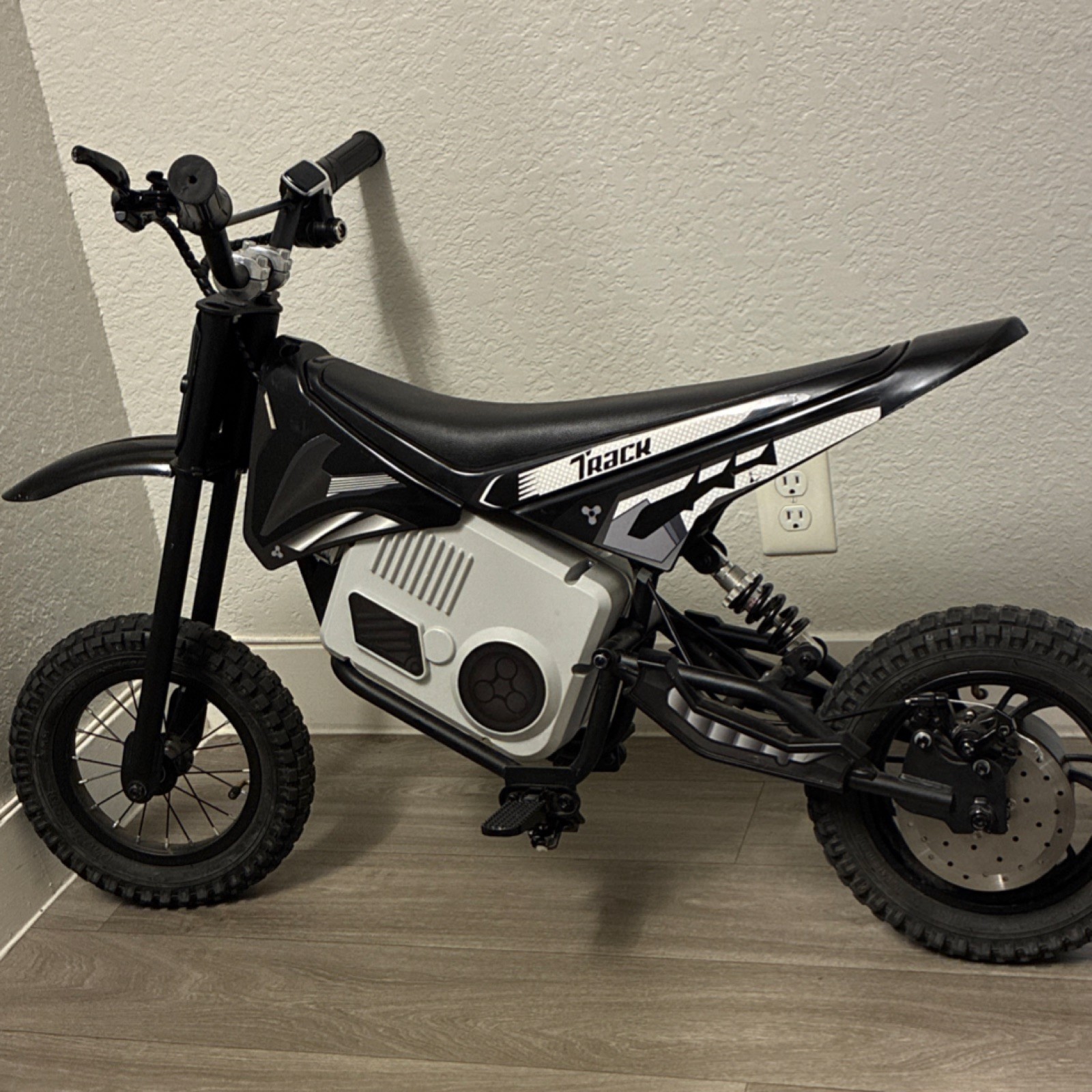 Track Battery Operated Black Ride-On Motorcycle with Charger and Key