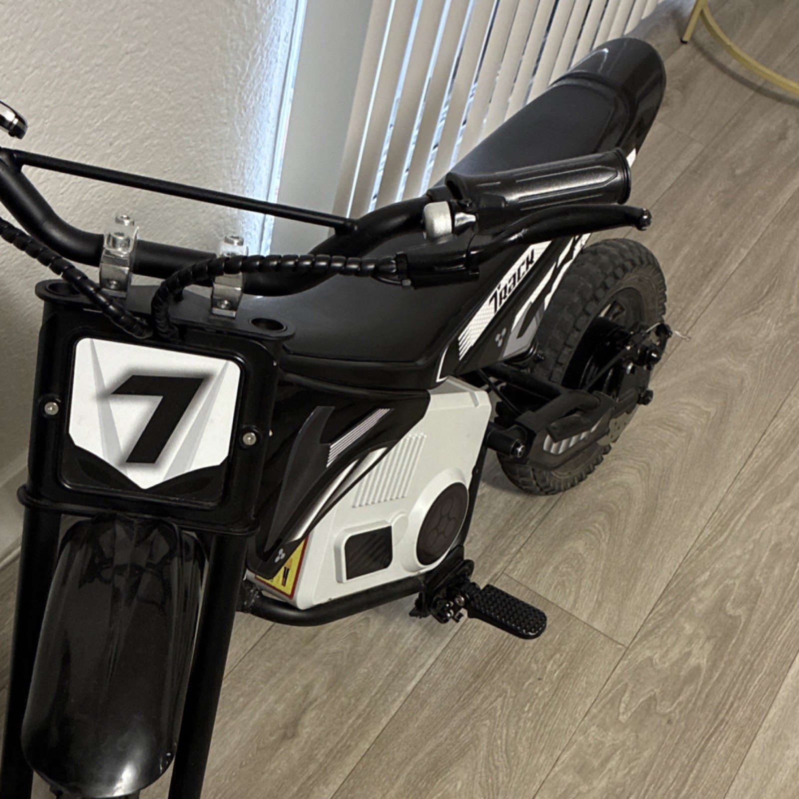 Track Battery Operated Black Ride-On Motorcycle with Charger and Key