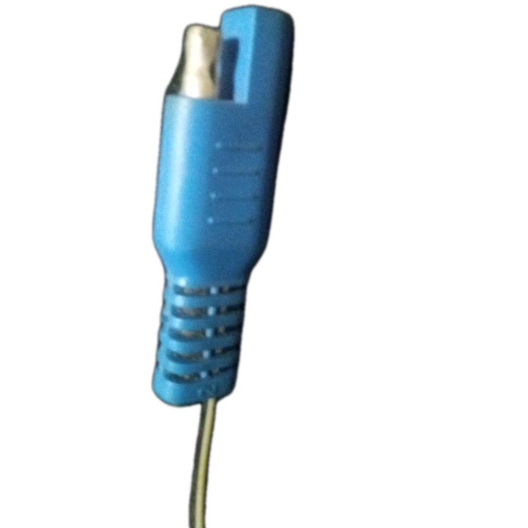 12V battery charger or connector harness designed for Kid Trax ride-on toys.