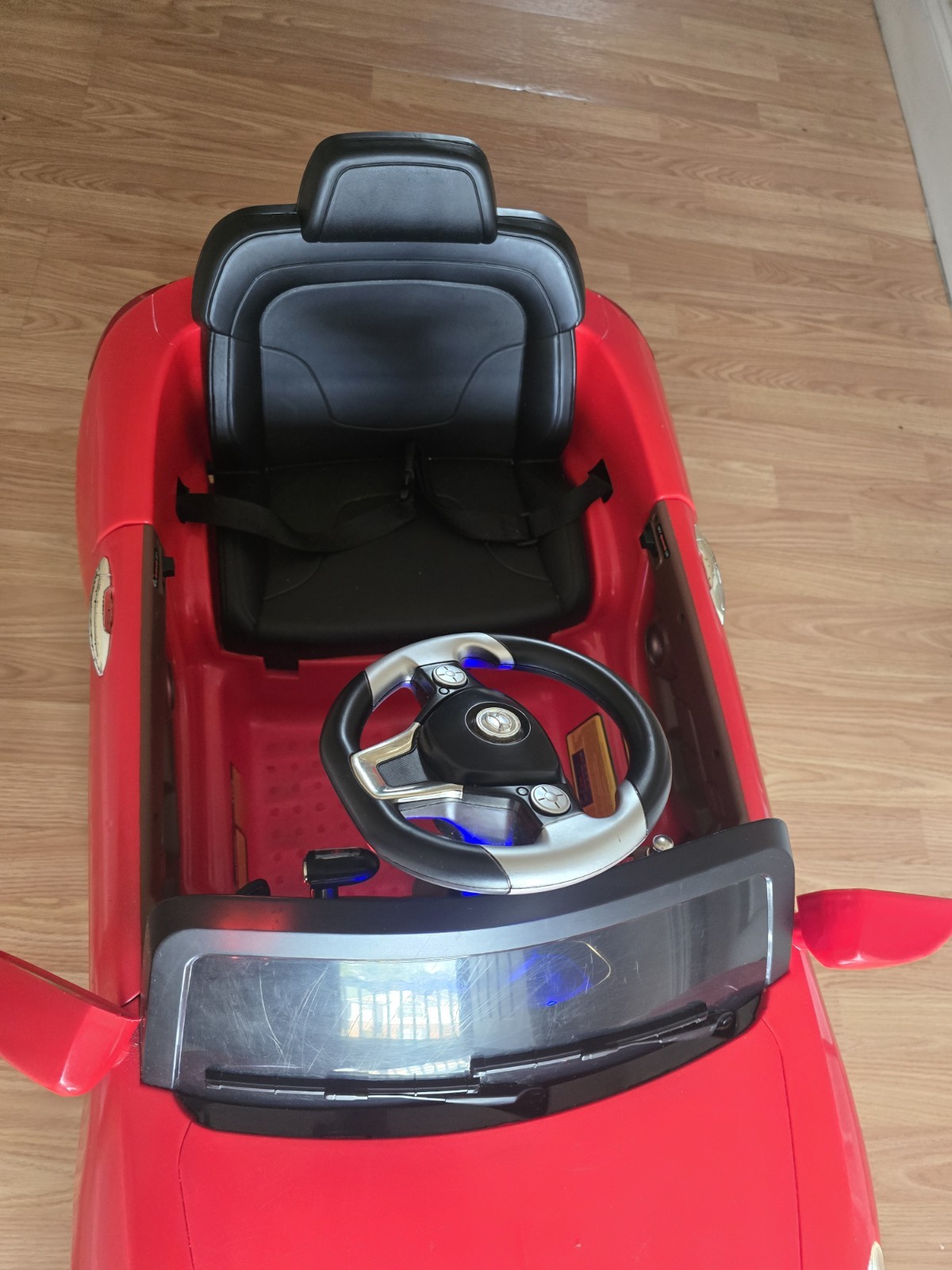 Mercedes-Benz SL65 12V electric ride-on car for children with remote control.