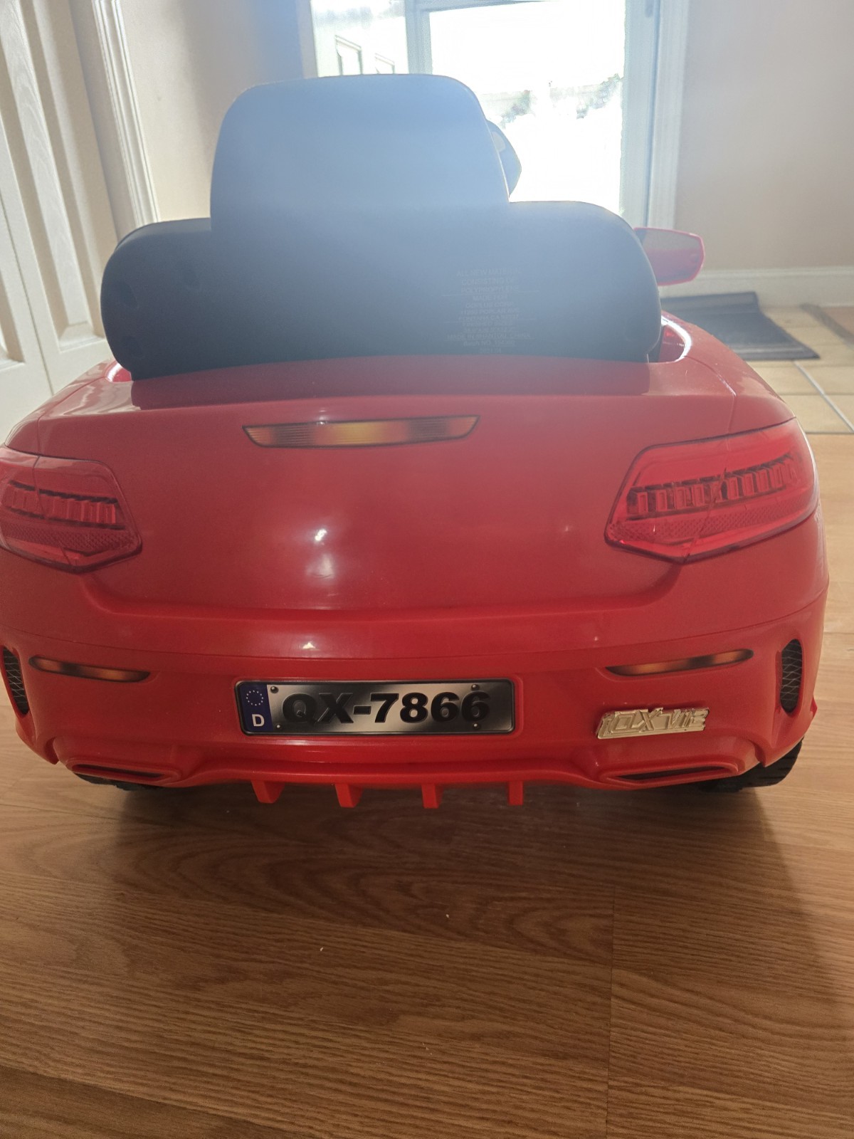 Mercedes-Benz SL65 12V electric ride-on car for children with remote control.