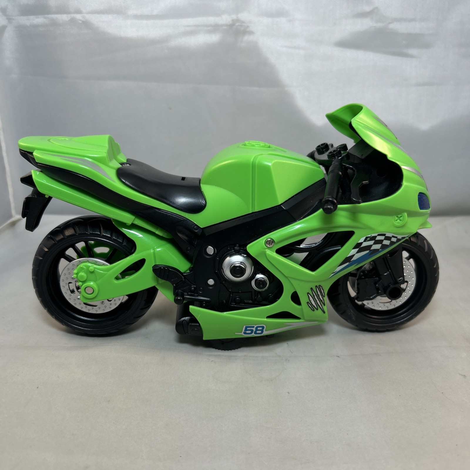 Raxx Wheel Motorcycle Light And Sound Friction Green – *Does not Work*